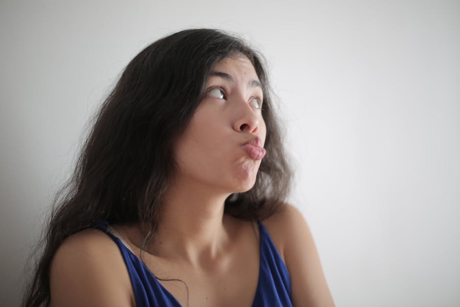 A humorous character leaving a voicemail with playful expression and a quirky phone.