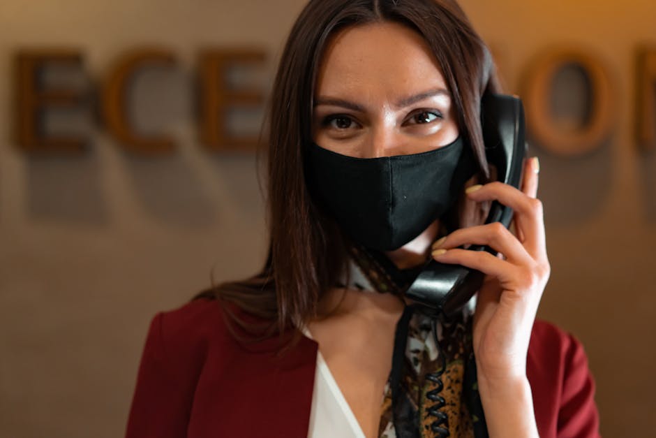 An engaging graphic showing a vibrant office environment, highlighting interaction between an AI receptionist and customers through email and phone.