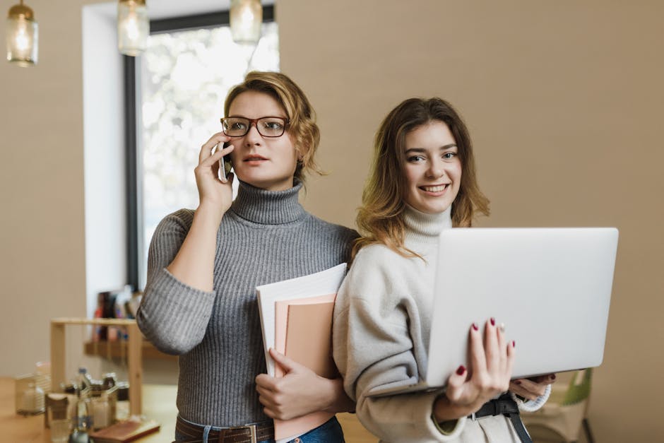 An engaging workspace showing a team utilizing call forwarding technology on their devices