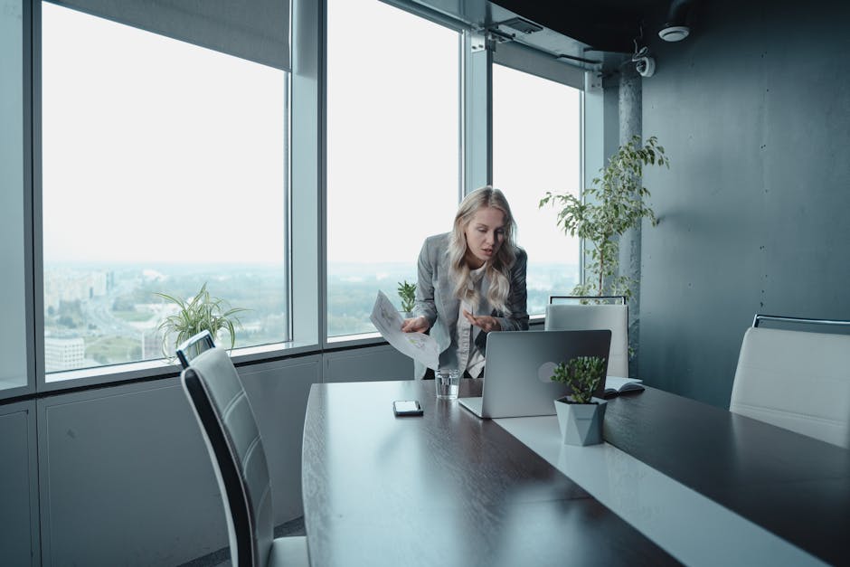 A dynamic office environment showcasing professionals on calls, highlighting the importance of communication in business.