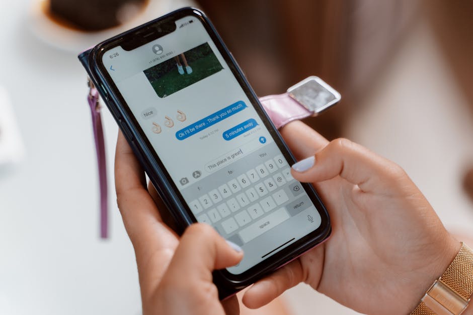 Close-up of an iPhone messaging app showcasing a conversation with multiple recipients engaged in a lively exchange.