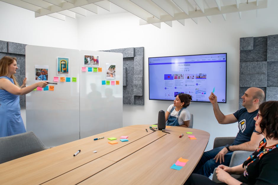 An image of a diverse team discussing AI solutions around a conference table, with visual aids on a screen.