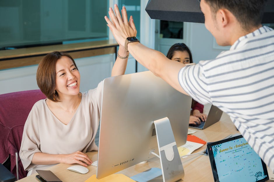 A friendly front desk with a digital assistant greeting a diverse group of happy customers.