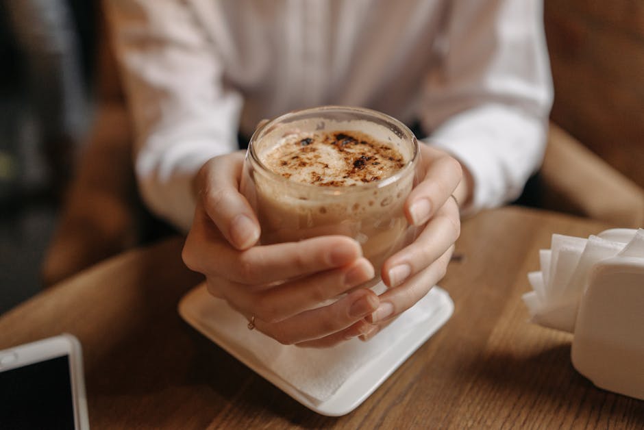 An inviting coffee shop with a bustling atmosphere, showcasing latte art and vibrant colors, symbolizing personalization in customer experiences.