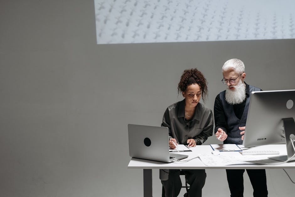 A diverse group of professionals collaborating around a digital interface featuring an AI receptionist.