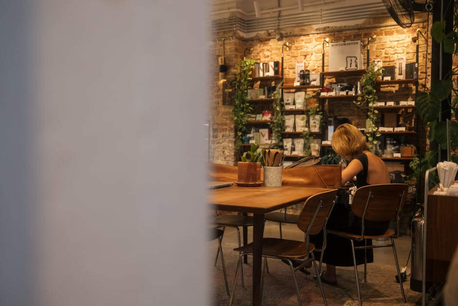 A warm, inviting AI receptionist interface on a tablet in a cozy coffee shop setting