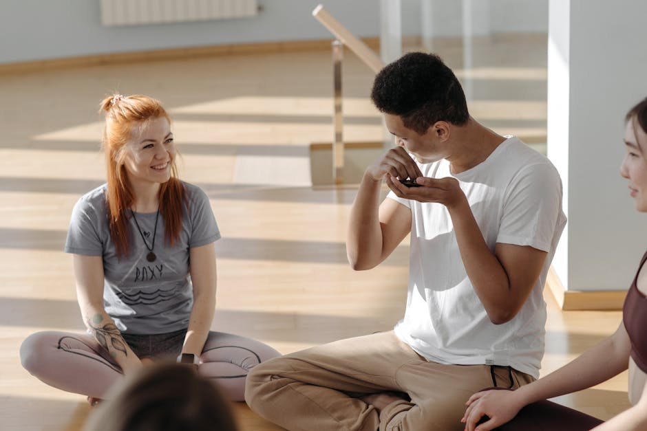 A serene yoga studio with a diverse group of people practicing together, creating a sense of community.