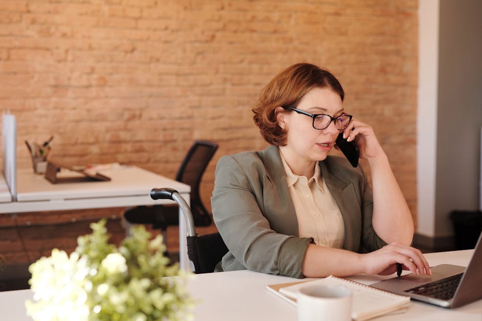 A modern office setting with professionals using AI solutions, showcasing a digital dashboard for call management.