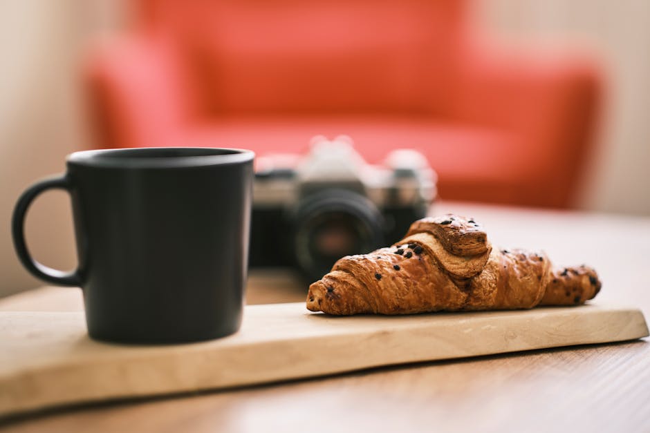 A vibrant image of a bakery scene with a cozy atmosphere, showcasing freshly baked bread and pastries, hinting at customer interactions with a friendly AI phone agent in the background.