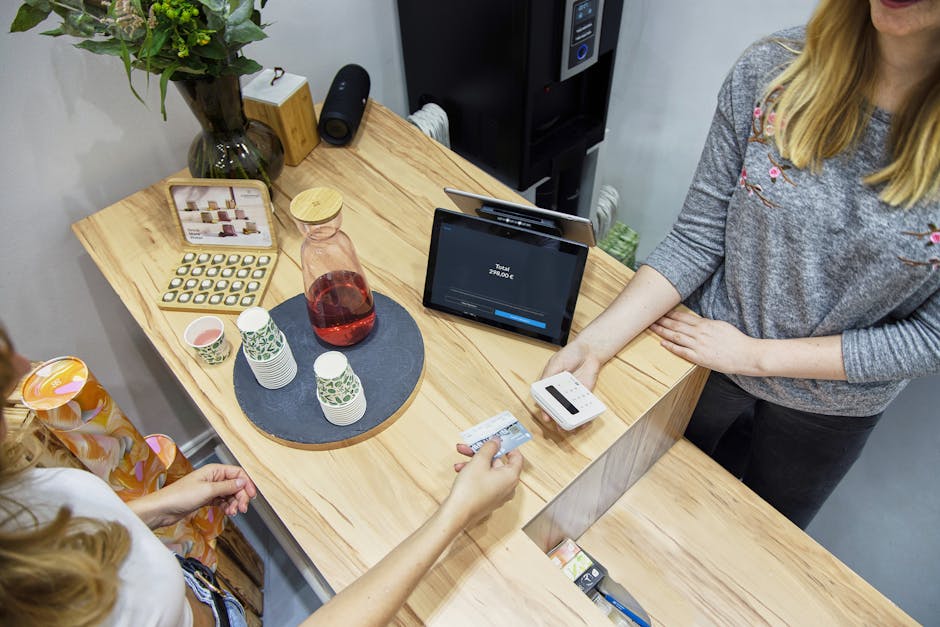 A modern bubble tea shop staffed by friendly employees, showcasing a vibrant atmosphere with colorful drinks available for customers, illustrating the connection between technology and great customer service.
