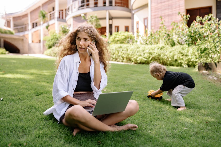 An image depicting a business professional using a smartphone while working remotely, showcasing the ease of communication and connectivity.