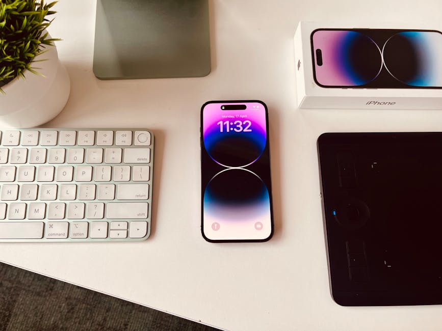 A modern office setup with a landline phone and a mobile phone showcasing a seamless communication transition