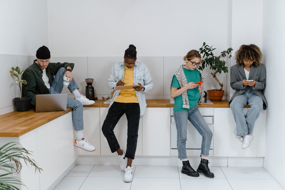 A vibrant office scene showcasing a business team collaborating, using smartphones and digital tools, embodying modern communication.