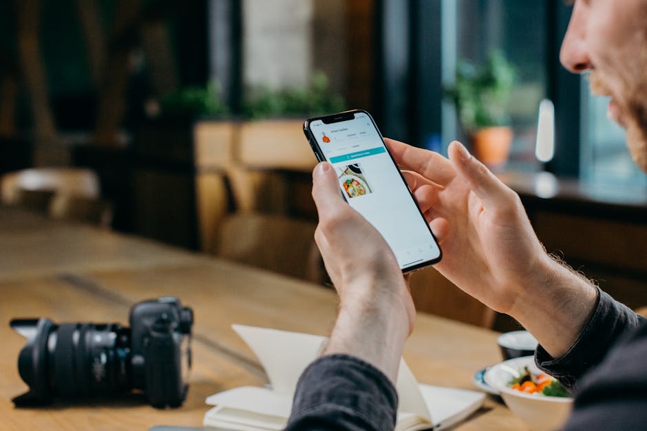 An inviting office setting with a smartphone displaying a voicemail sharing interface, emphasizing personal connections in communication.