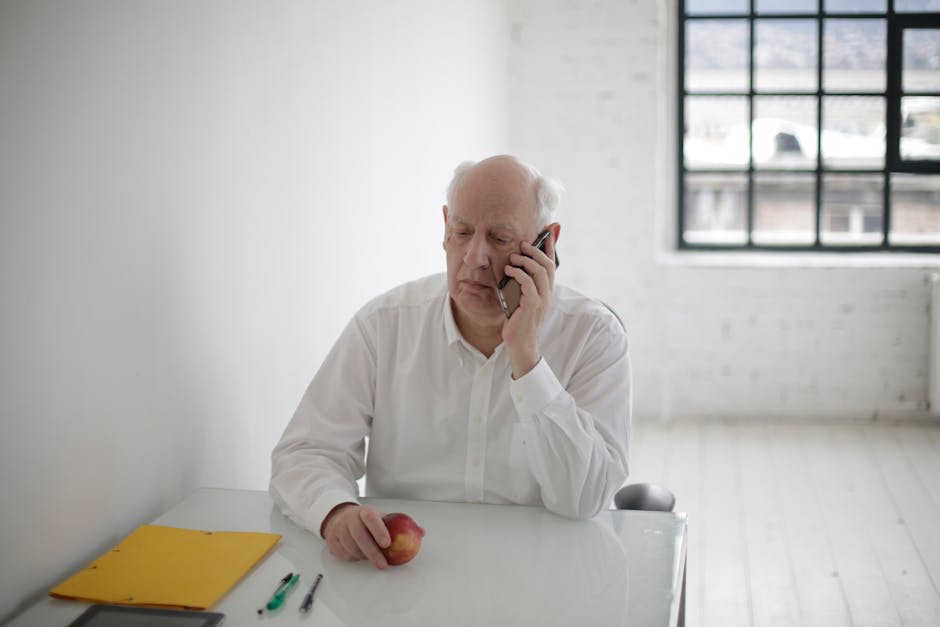 An image depicting a professional using a cell phone in a modern office environment, showcasing a seamless connection between business and AI technology