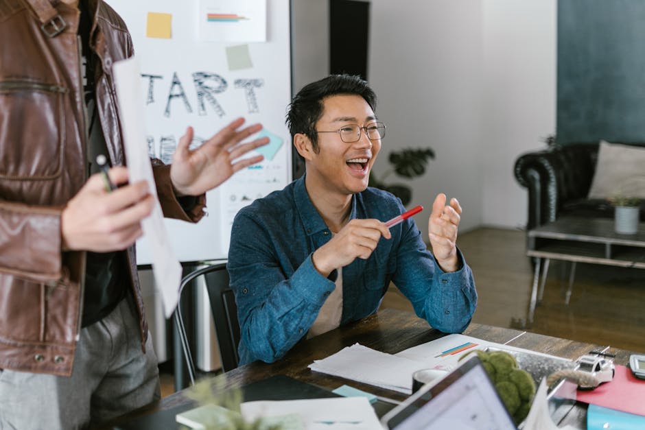 A vibrant image of a business team engaged in a lively discussion about improving customer engagement through technology, featuring visuals of AI and voicemail