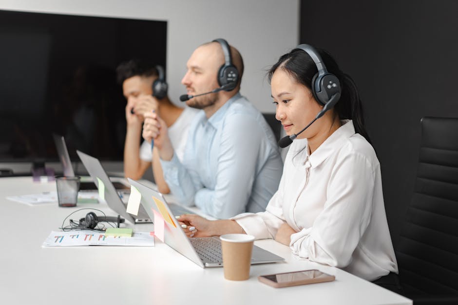 A vibrant workspace with a team using AI tools to engage clients, illustrating the blend of technology and human interaction.