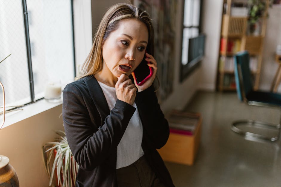 A cozy office setting with a business professional on a phone call, showing engagement and attentiveness.