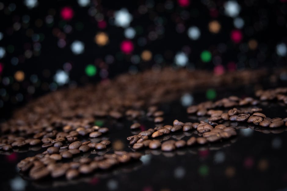 A vibrant coffee roasting setup with colorful beans, an espresso machine, and a cozy ambience