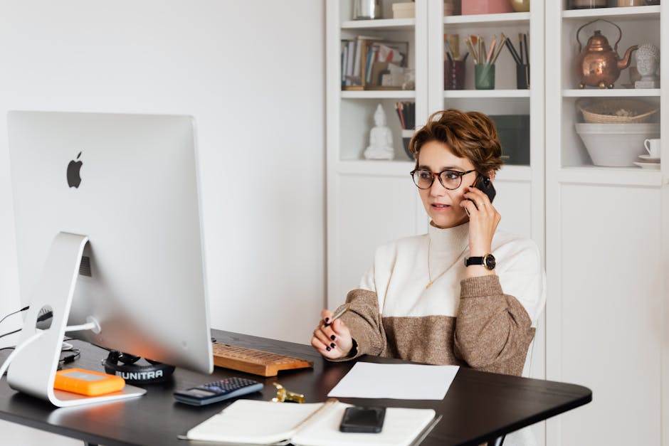 A busy office environment with individuals using AI tools to manage calls and communications effectively, depicting a modern and engaging workspace.