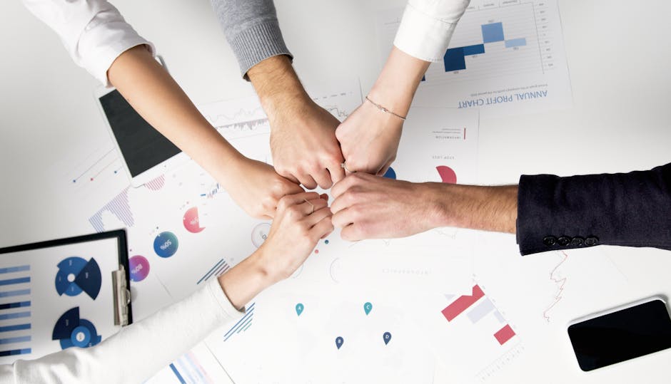 A modern office setting with a diverse team using AI-driven tools for customer engagement, showcasing screens with data analytics and communication.