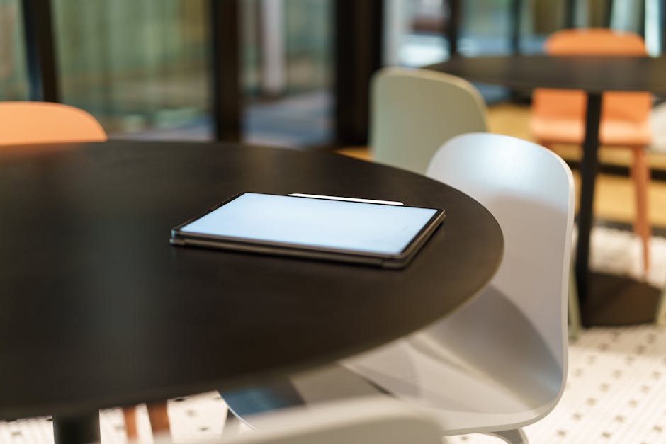 A professional showing an iPhone with a voicemail sharing feature open, highlighting the simplicity and user-friendliness of the process.