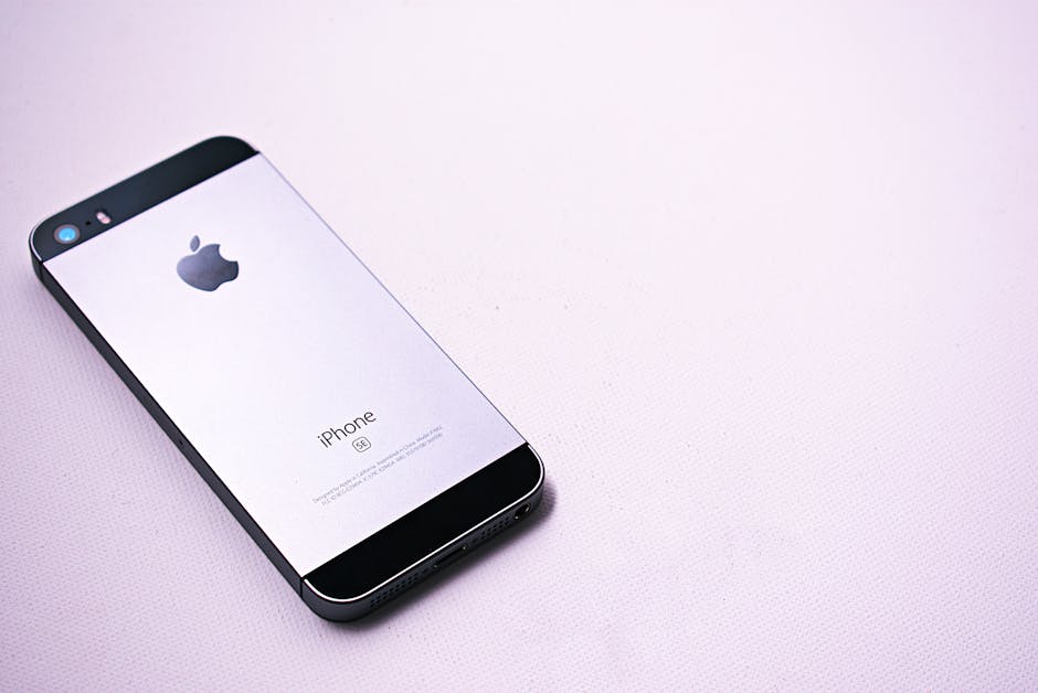 A sleek smartphone displaying a call blocking feature, with professional icons representing business communication