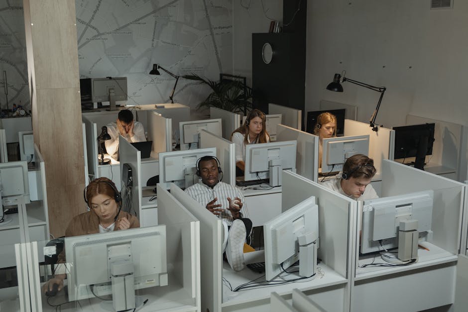A vibrant graphic showing a busy office environment with professionals making calls, emphasizing productivity