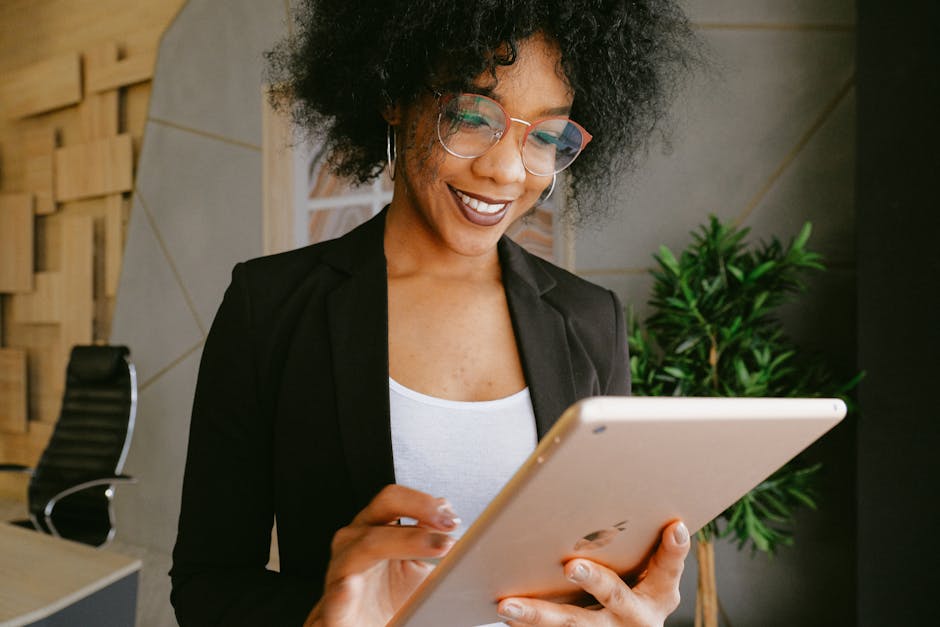 A professional office setting with a person answering the phone, conveying a friendly and efficient demeanor.