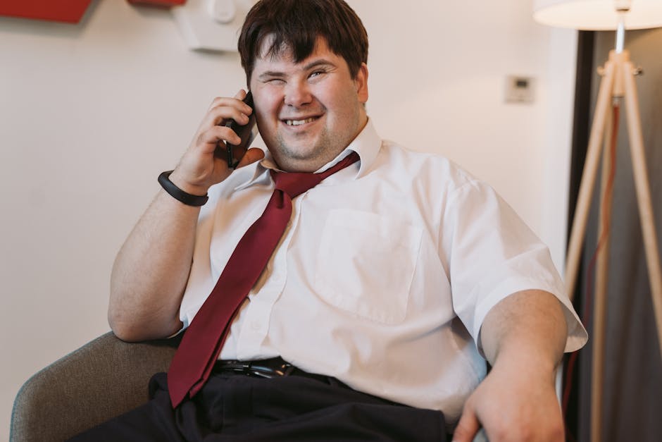 A warm and inviting office setting with a friendly person answering the phone, showcasing a sense of approachability.