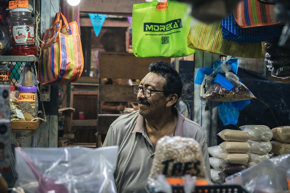 A friendly phone agent engaging with a customer, with colorful mushroom products displayed around.