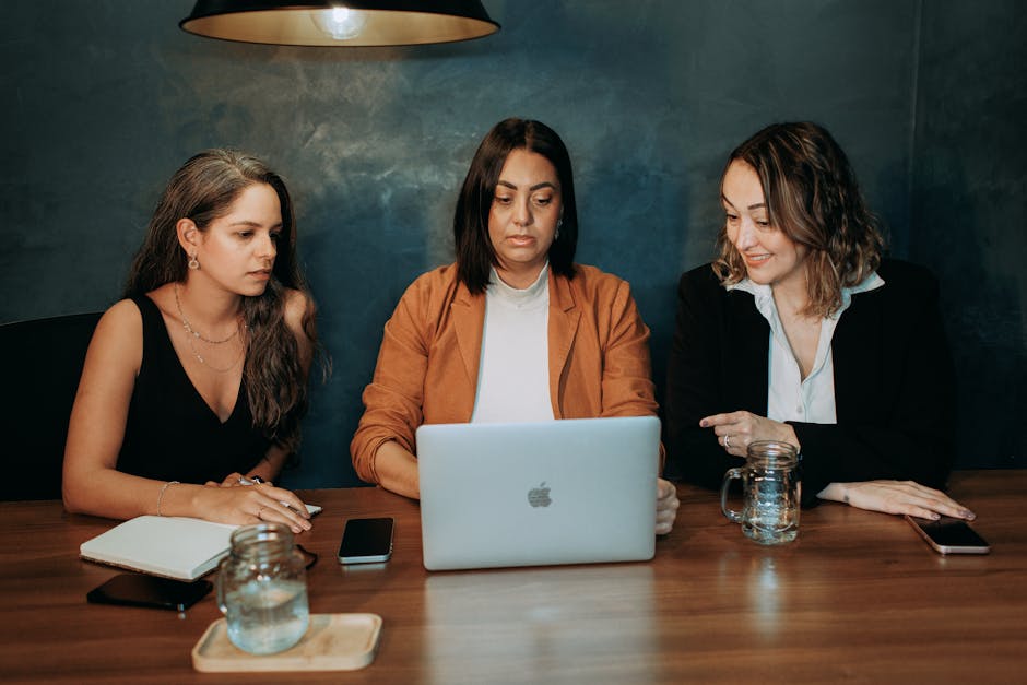 Modern office setup with a team actively engaging in calls and utilizing AI technology, showing a seamless workflow.