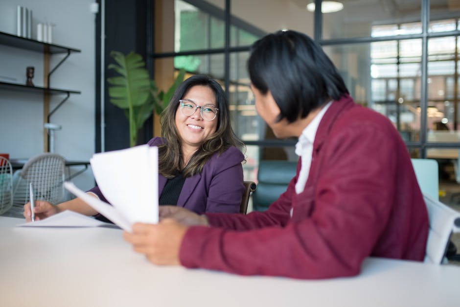 Dynamic office setting with a team collaborating, ideally illustrating effective communication.