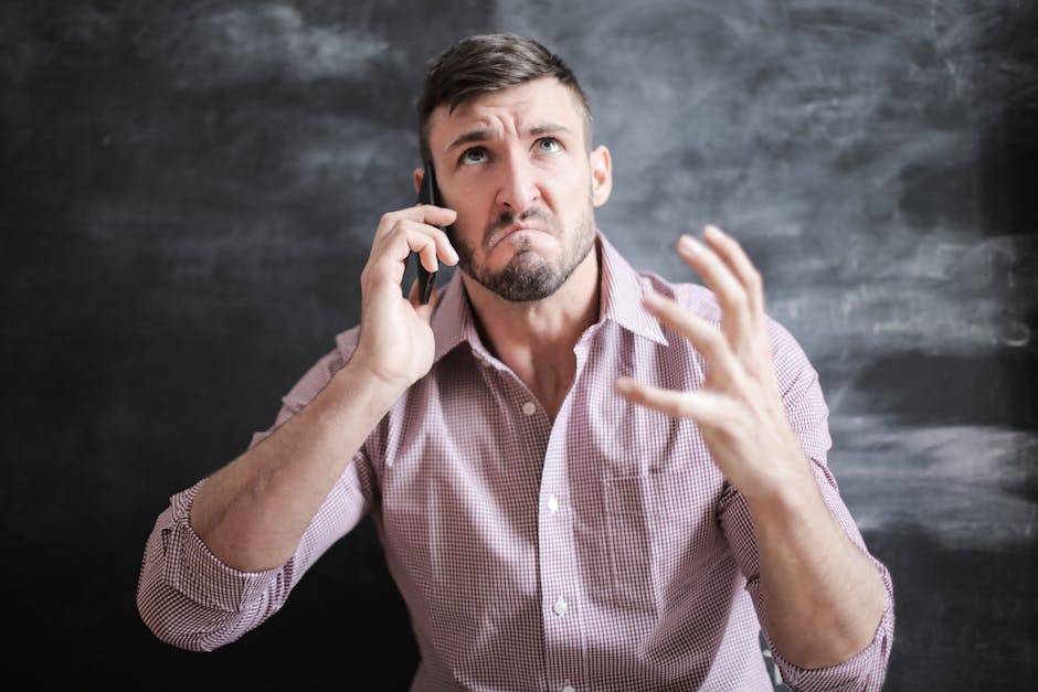 A professional looking set up showing a business owner seamlessly managing calls between their business phone and cell phone using advanced technology.