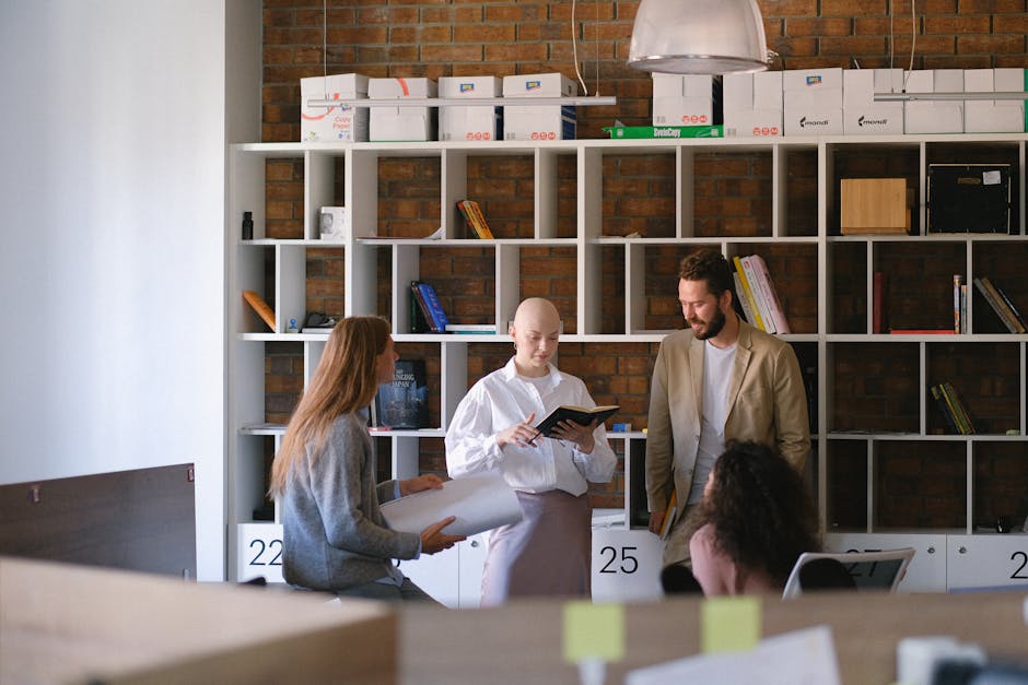 An image of a modern office setting with an employee engaging with clients over the phone, illustrating the professional atmosphere an 800 number can create.