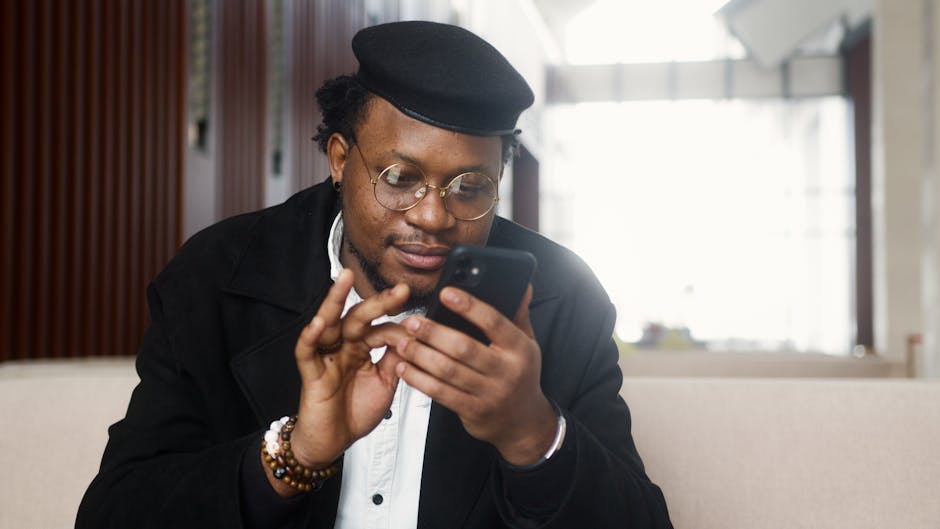 A warm and friendly phone greeting scene with a person smiling while talking on the phone in a cozy office