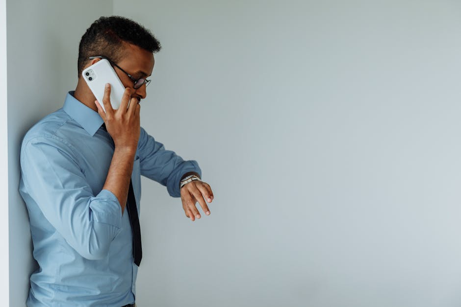A professional setting showing a sleek office environment with a business person engaged in a phone call, surrounded by AI technology.