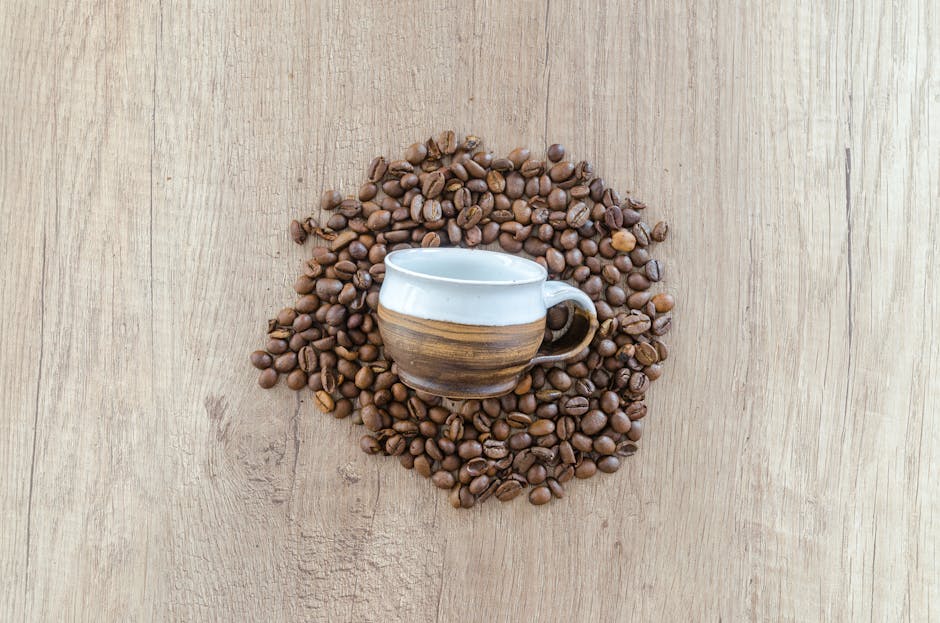An inviting coffee roastery setup, showcasing a variety of roasted beans with promotional materials and engaged customers enjoying their coffee.