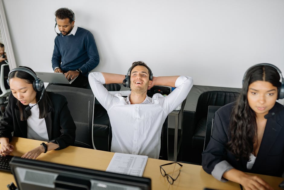 A bustling office environment with employees engaging actively on calls using advanced AI technology.