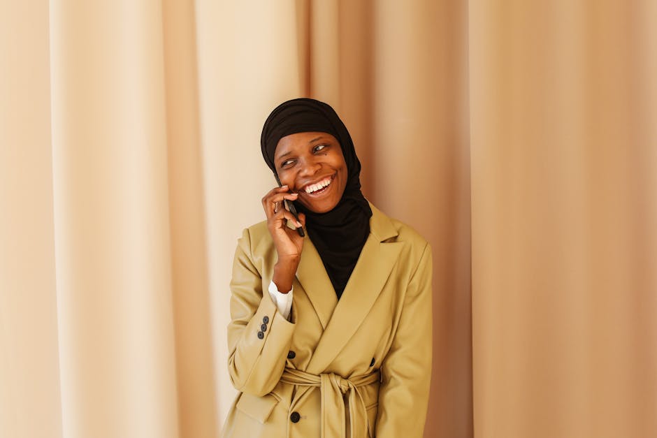 A close-up image of a diverse group of business professionals engaged in a phone call conversation, symbolizing clear communication.