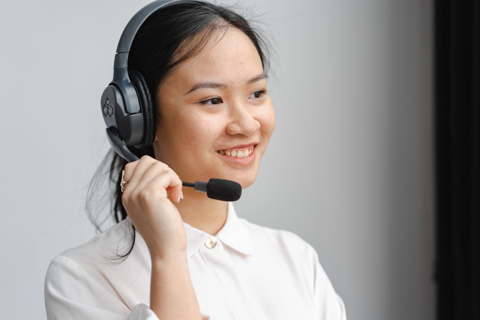 A friendly phone agent speaking with a customer about landscaping projects, showcasing engagement and professionalism.