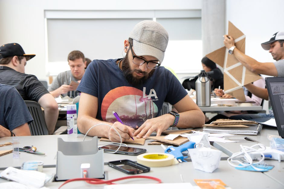A creative visual showing a person interacting with a smartphone using voicemail transcription features, surrounded by art supplies.