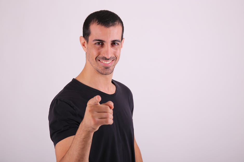 Image showing a personal trainer engaging with clients over the phone, highlighting a friendly and professional atmosphere.