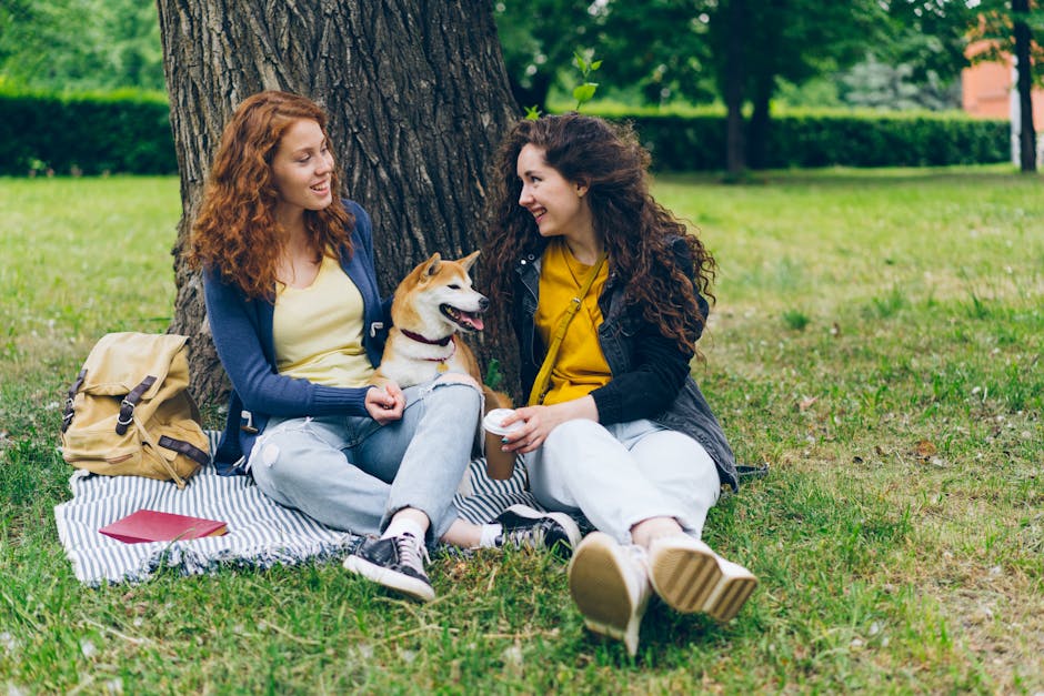 A friendly pet boarding agent talking on the phone, surrounded by happy pets in a welcoming environment.