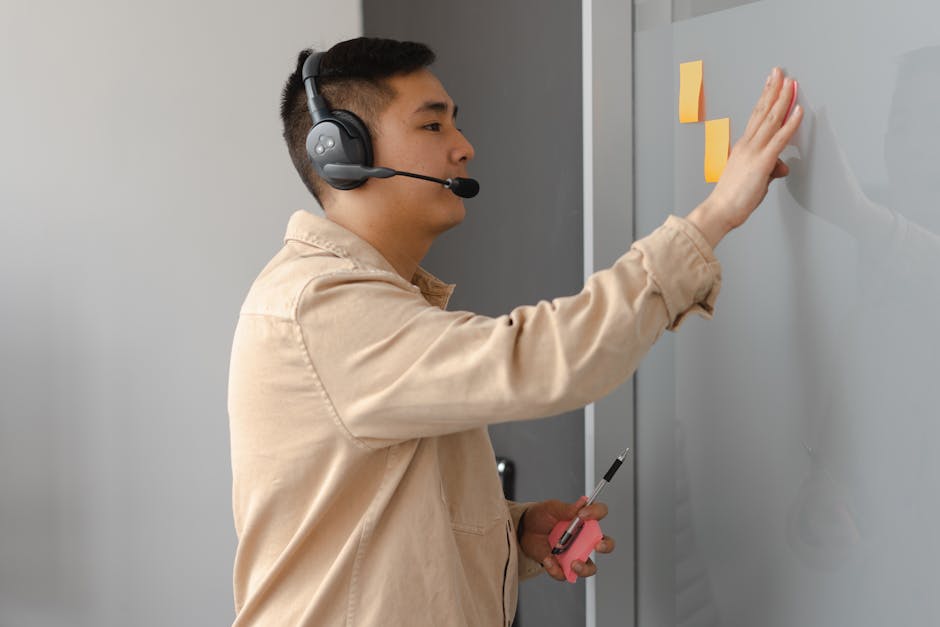 An image of a professional phone agent speaking with a client about wind turbine maintenance, capturing an engaging and attentive interaction.