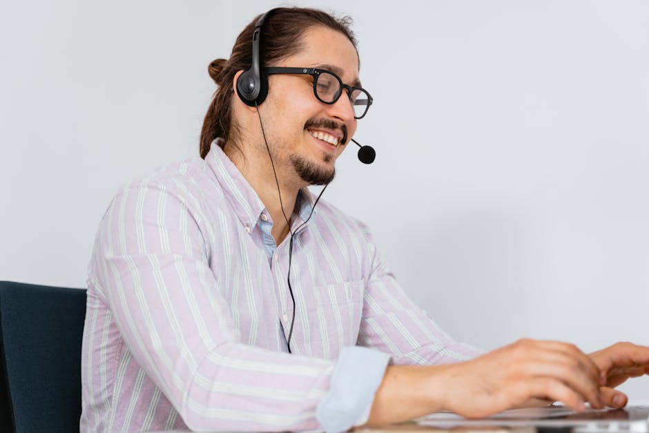 A friendly agent on the phone, smiling, with RV photos in the background, symbolizing connection and customer service.