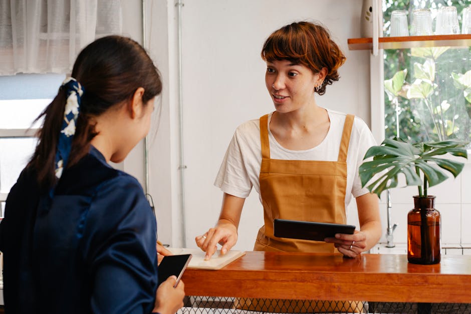 A phone agent conversing with a potential customer about massage therapy, displaying a warm and professional atmosphere.