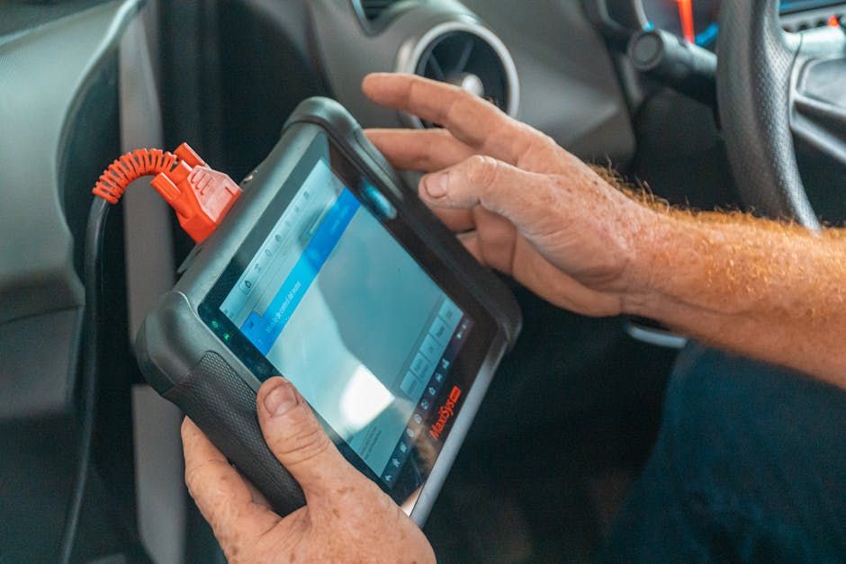 A technician interacting with a customer over the phone while using a tablet to access maintenance records, showcasing the integration of technology in wind turbine maintenance.
