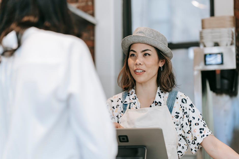 A bubbly and bright team training session with an AI assistant and employees practicing customer service skills over a bubbly tea counter.
