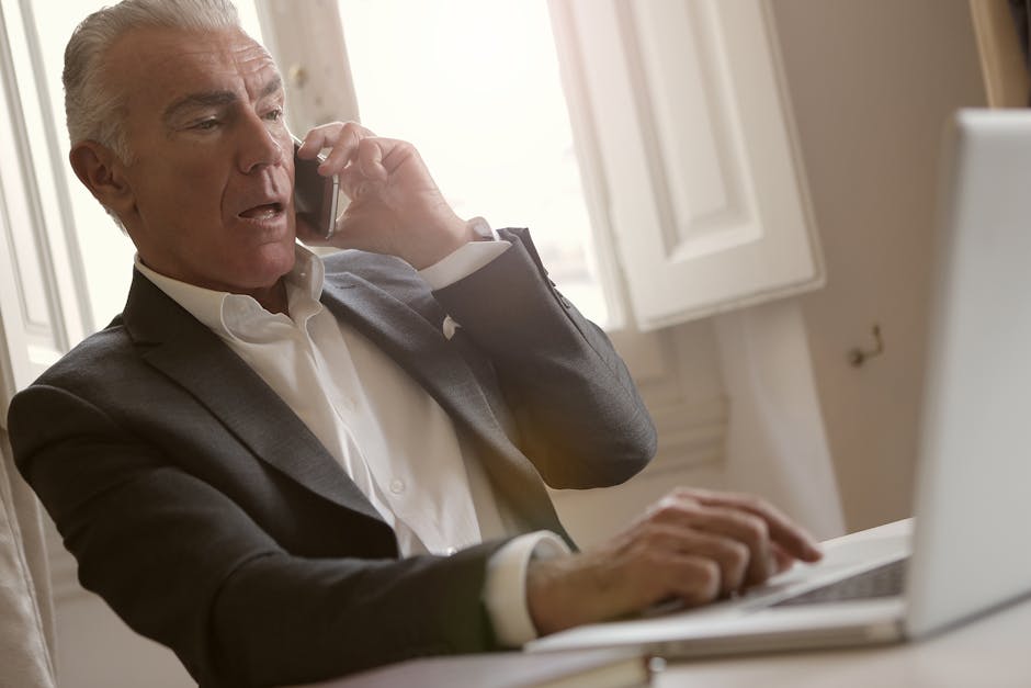 A warm, inviting office setting with a phone agent speaking kindly to an elderly client, showcasing compassion and professionalism.